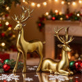 Nordic gold reindeer pair — set of 2 tabletop figurines